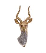 A diamond stag brooch