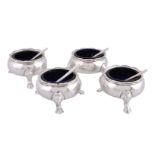 ϒ A set of four George II silver cauldron salt cellars by James Smith I