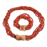 ϒ A multi strand coral necklace