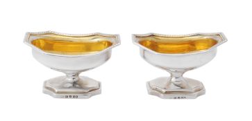 A pair of George III silver pedestal salt cellars by William Abdy II