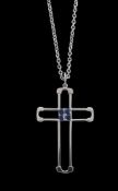 A sapphire cross pendant