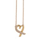 A diamond Loving Heart pendant by Paloma Picasso for Tiffany & Co.