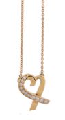 A diamond Loving Heart pendant by Paloma Picasso for Tiffany & Co.