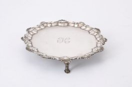 A George III silver shaped circular waiter by John Carter II