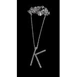 A diamond initial K pendant