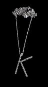 A diamond initial K pendant