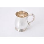 A silver baluster mug by Thomas of New Bond Street