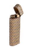 Cartier, a gold coloured woven lighter