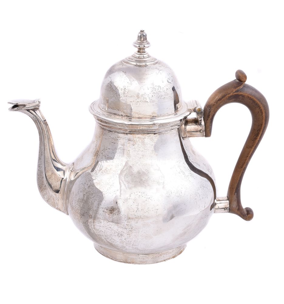 A silver baluster tea pot by Tessiers