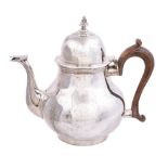 A silver baluster tea pot by Tessiers