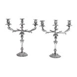 A pair of old Sheffield plate three light candelabra