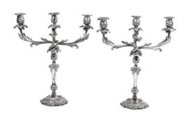 A pair of old Sheffield plate three light candelabra