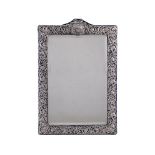 A late Victorian silver dressing table mirror by Henry Matthews