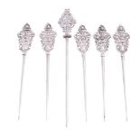 Six Victorian silver poultry skewers