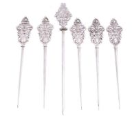 Six Victorian silver poultry skewers