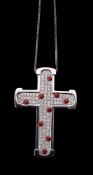 A diamond and coral cross pendant