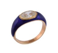 A diamond and enamel ring