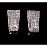 A pair of diamond earrings