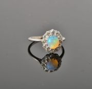 An opal and diamond cluster ring