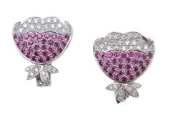 A pair of diamond and pink sapphire earrings