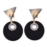 A pair of onyx and diamond earrings