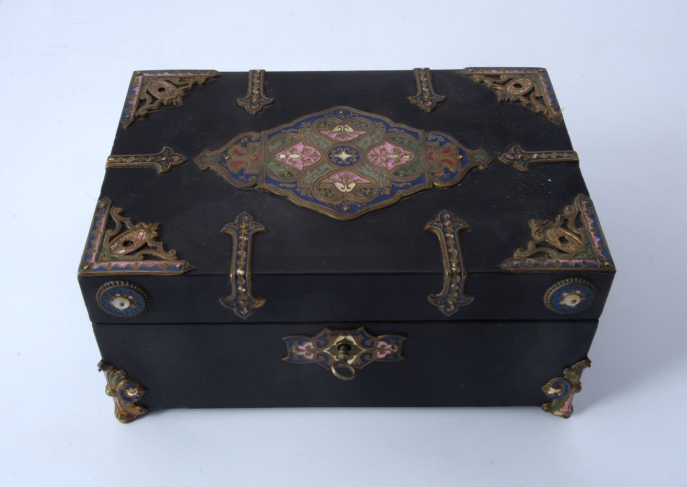 A champlevé enamel, brass and ebonised box
