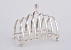 A silver six division toast rack