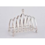 A silver six division toast rack