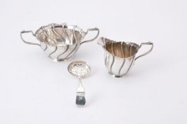 A late Victorian Irish silver sugar bowl and milk jug by The Goldsmiths & Silversmiths Co. Ltd