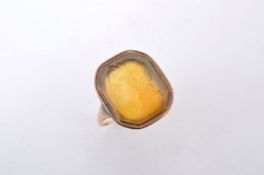 An early 19th century gold coloured metal seal ring