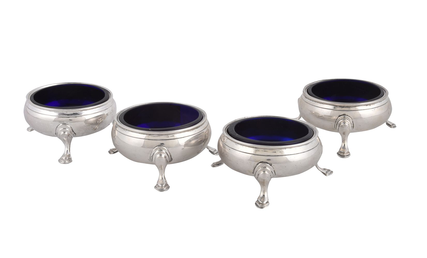A set of four late George III silver cauldron salt cellars by Stephen Adams II