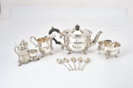 A silver shaped circular three piece tea service by Edward Barnard & Sons Ltd