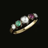 A diamond, ruby and emerald ring
