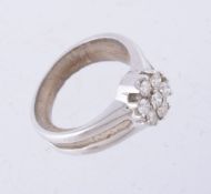 A diamond cluster ring