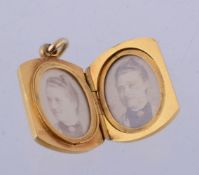 A locket pendant of rectangular form with curved ends