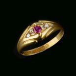 An 18 carat gold ruby and diamond ring