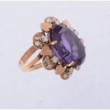 An amethyst and diamond ring