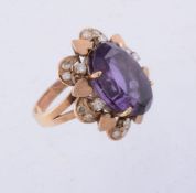 An amethyst and diamond ring