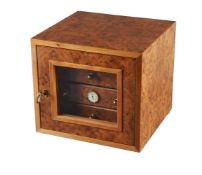 A burr wood cigar humidor