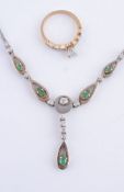 An emerald and diamond necklace