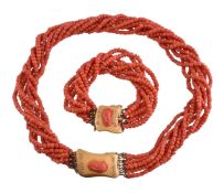 ϒ A multi strand coral necklace
