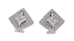 A pair of diamond earrings