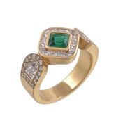 An emerald and diamond ring