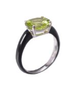 A peridot and enamel ring