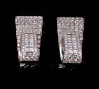 A pair of diamond earrings