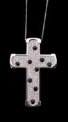 A diamond and onyx cross pendant