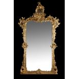 A pair of carved gilt wood overmantel wall mirrors