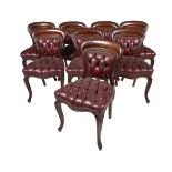 A set of eight Victorian mahogany and leather upholstered dining chairs
