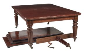 A Victorian mahogany extending dining table