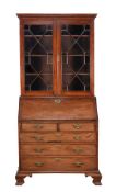 A mahogany bureau bookcase